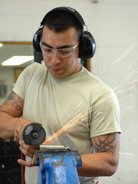 .DYESS AIR FORCE BASE, Texas – Tech. Sgt. Pedro Vasquez, 7th Equipment Maintenance Squadron Aircraft Structural Maintenance Production Viper Superintendent, trims a number two suction hydraulic line for a number two engine on a B-1 Bomber June 30 at the aircraft structural maintenance shop here. Maintainers repair aircraft in preparation for deployments and training in support of Overseas Contingency Operations.  (U.S. Air Force photo/Senior Airman Jenifer H. Calhoun)