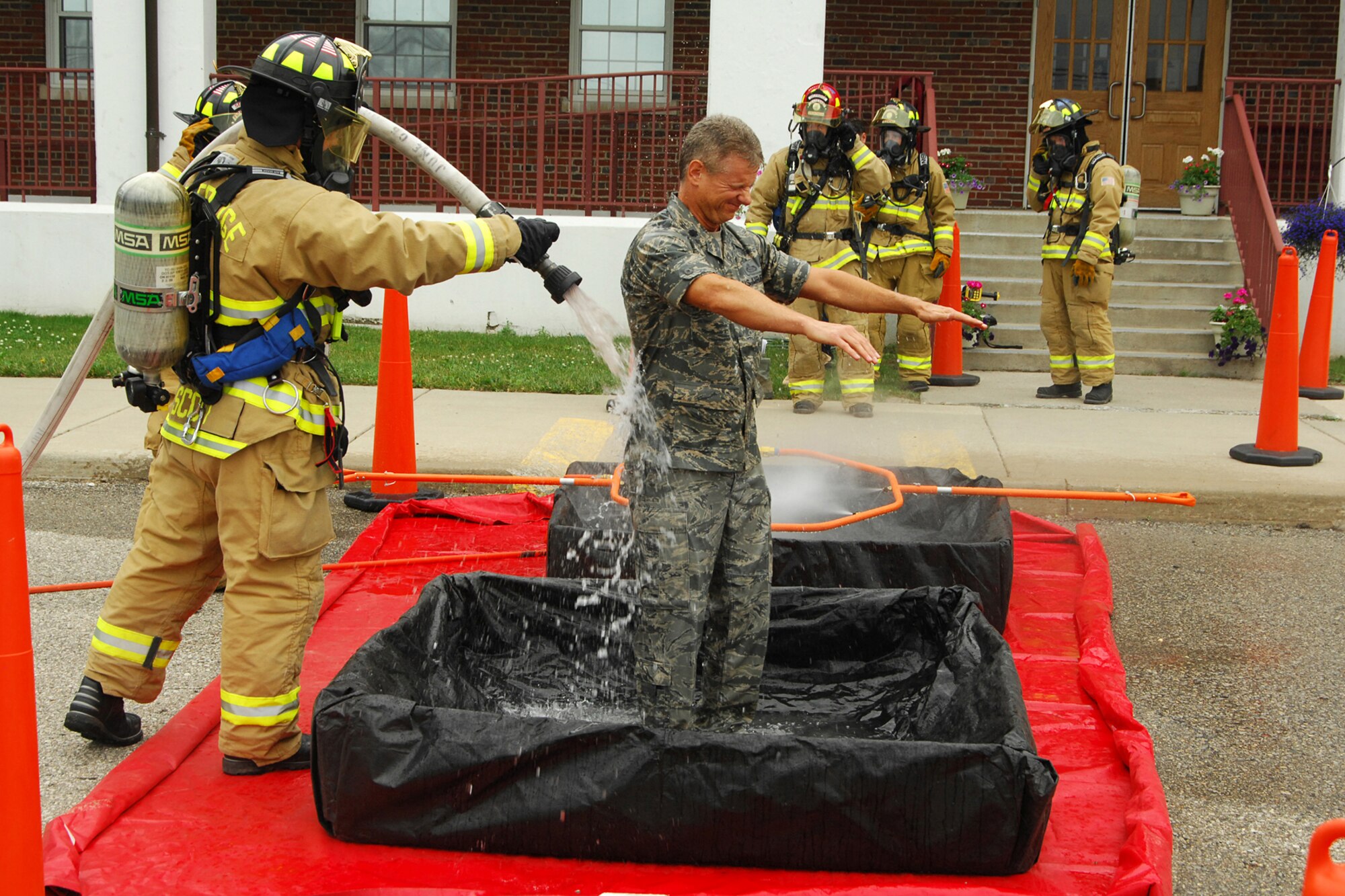 The 127th Wing, Michigan Air National Guard, participated in a week-long joint emergency management training exercise called Vigilant Guard 2010.  On Tuesday, June 15, after reports of suspicious packages being sent through the mail, 127th Security Forces personnel evacuated facilities while the Selfridge ANG Base Fire Department HAZMAT team responded to search for and rescue mock victims of a possible anthrax contamination.  The team set up a field decontamination station through which victims, firefighters, and found suspicious samples were processed. USAF Photo by John S. Swanson (Released)(100615)