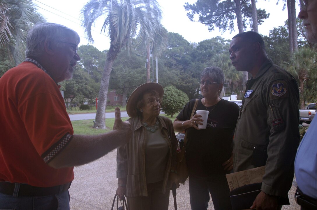 Panama City Kiwanis member Bill Hudson (left) discusses the Deepwater Horizon oil spill operation with Maj. Gen. Garry C. Dean, Air Forces Northern commander.  Also pictured are Clara Spaulding (middle, left) and Peggy Hudson.  (U.S. Air Force photo by Lt. Col. Susan A. Romano)