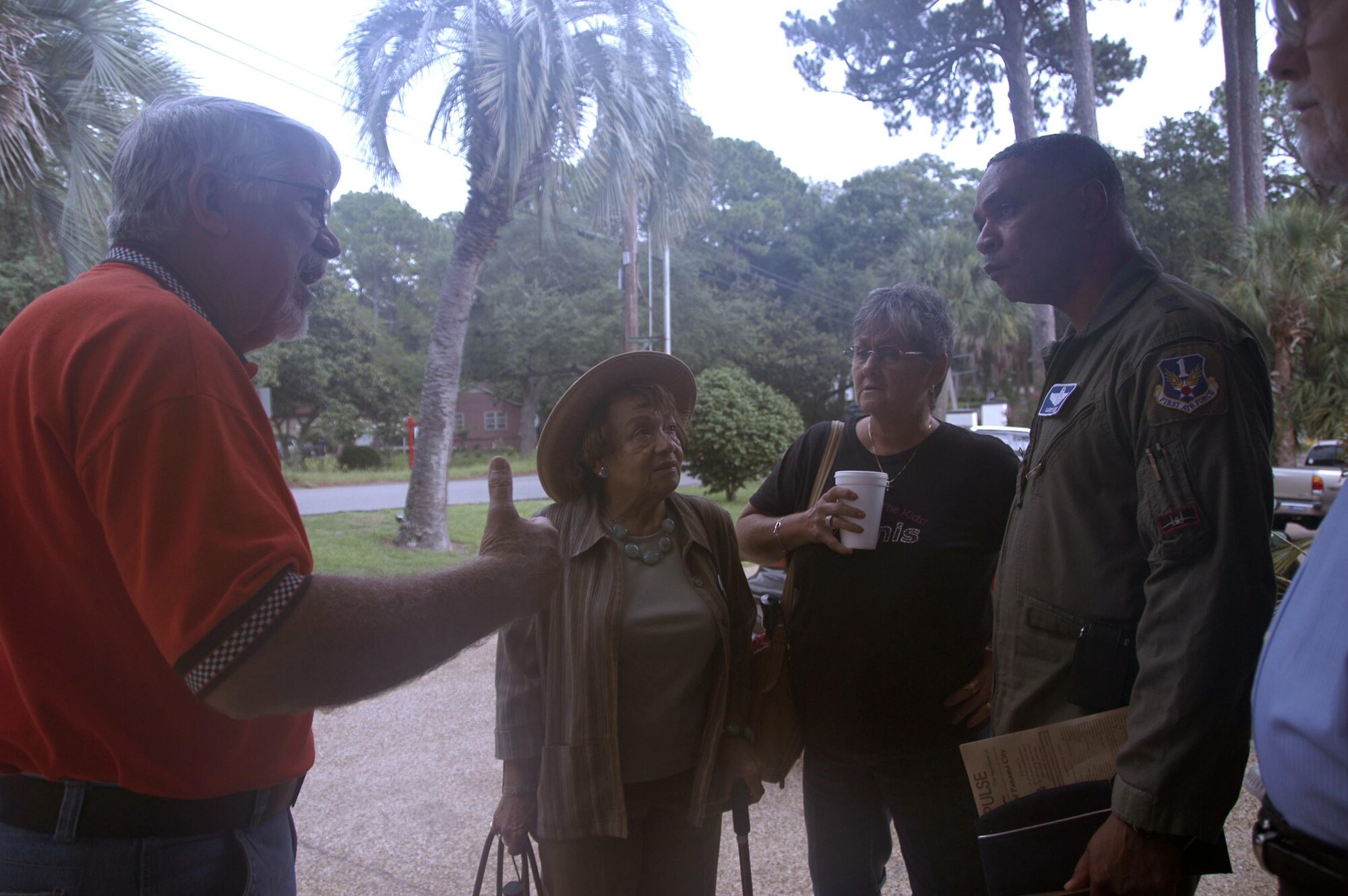 Panama City Kiwanis member Bill Hudson (left) discusses the Deepwater Horizon oil spill operation with Maj. Gen. Garry C. Dean, Air Forces Northern commander.  Also pictured are Clara Spaulding (middle, left) and Peggy Hudson.  (U.S. Air Force photo by Lt. Col. Susan A. Romano)