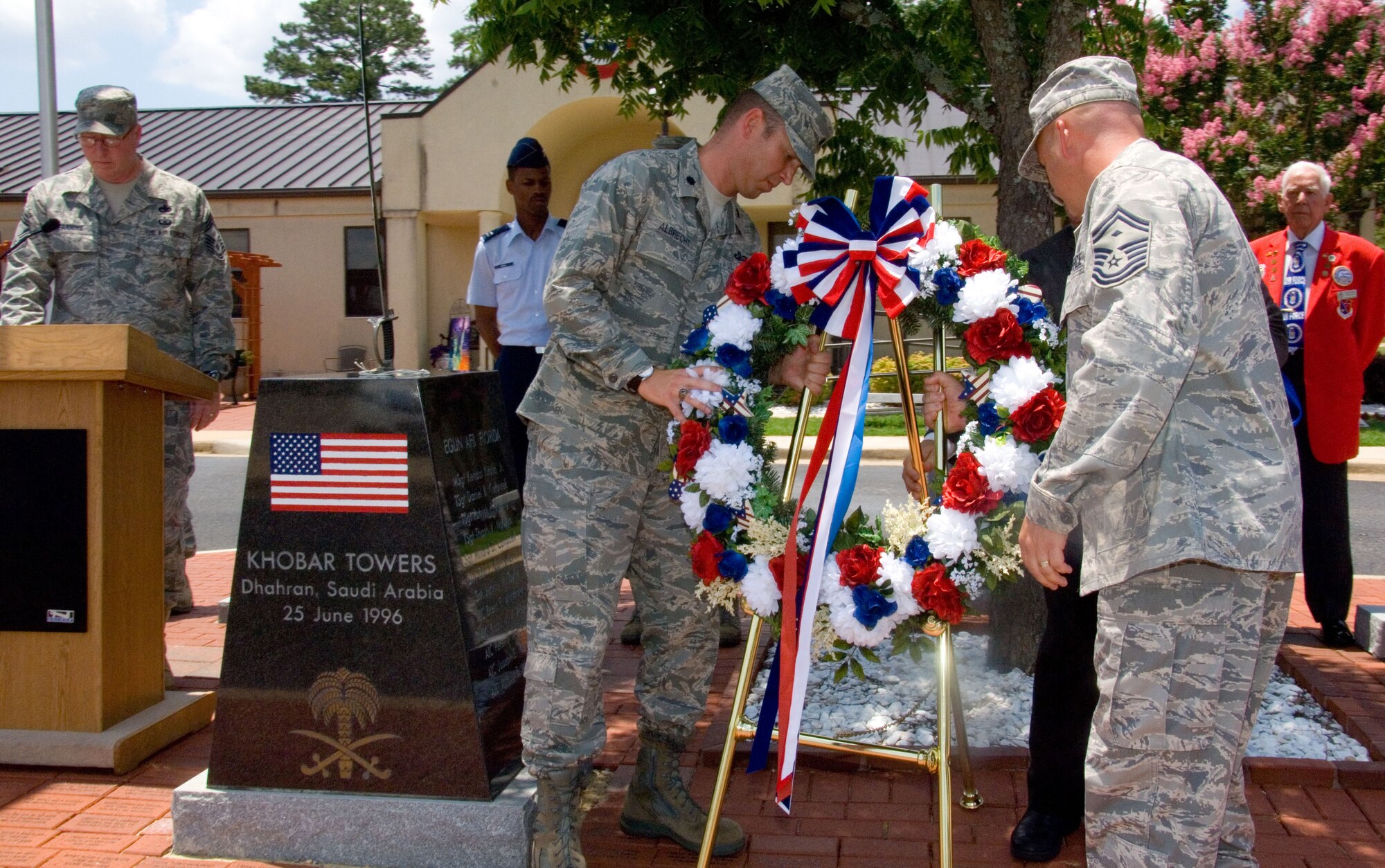 Lt. Col. Timothy Albrecht, Community College of the Air Force commandant, and Senior Master Sgt. David Scott, a First Sergeant Academy instructor who was at Khobar Towers when it was attacked June 25, 1996, place a wreath June 25 at the Khobar Towers memorial on Enlisted Heritage Hall’s plaza. The wreath-laying was to commemorate the 14th anniversary of the bombing that killed 19 American servicemembers.(U.S. Air Force photo/Melanie Rodgers Cox)