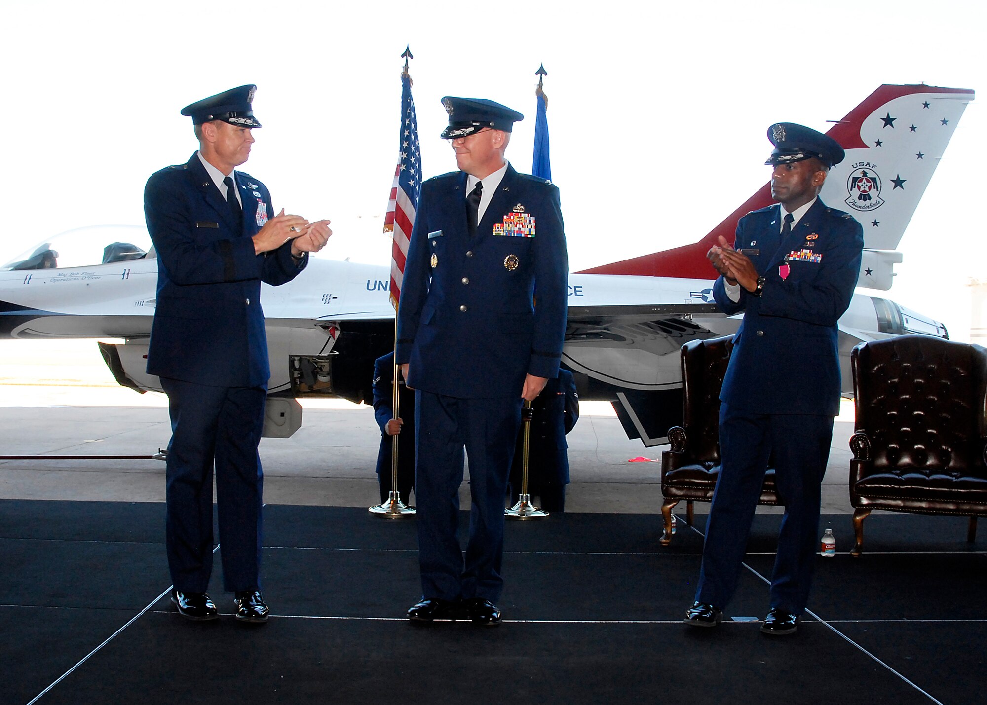 Brig. Gen. Darryl Burke (left), 82nd Training Wing commander, and Col. Tony Pounds(right), outgoing commander of the 782nd Training Group, welcome Col. Kenneth Backes (center), incoming 782nd TRG commander, at a change of command ceremony at Hangar 1010 on Sheppard Air Force Base, Texas, June 30, 2010. (U.S. Air Force photo/Mike Litteken)