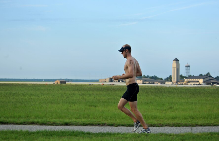 MOODY AIR FORCE BASE, Ga. -- Seth Novak, spouse of Senior Airman Rebecca Novak, 23rd Operations Support Squadron aircrew flight equipment, is the leader during the run portion of a triathlon event here June 25. Mr. Novak participates in two triathlons a month and trains six days a week all for the enjoyment of the sport. (U.S. Air Force photo by Airman 1st Class Joshua Green/RELEASED)