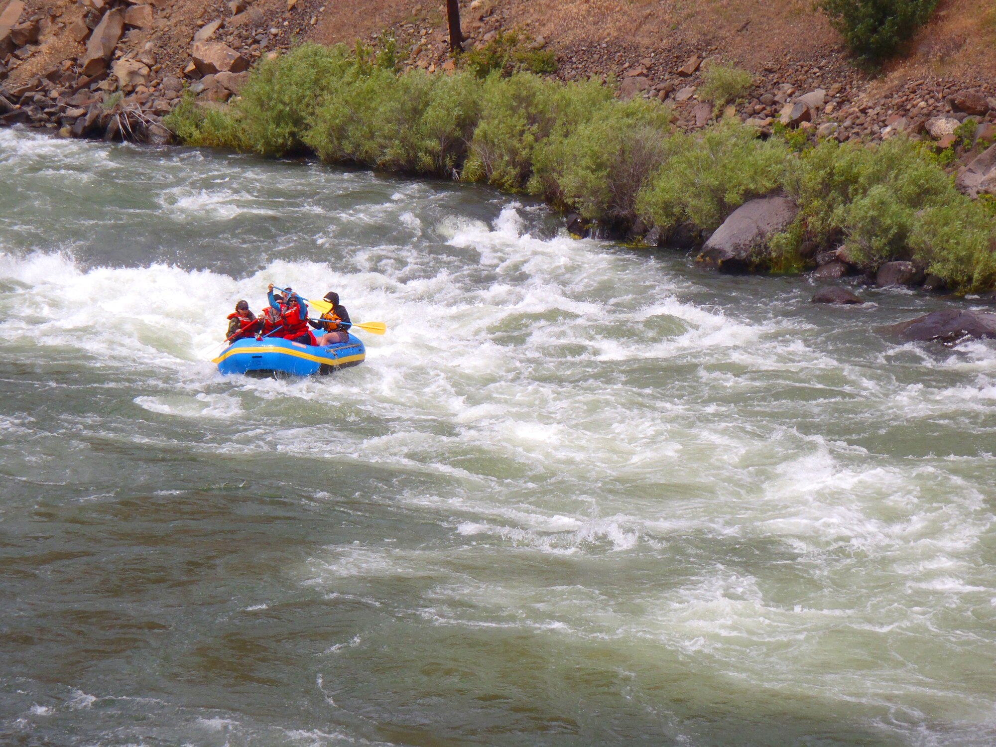 Outward Bound students learned to navigate and captain rafts through strong rapids while on an Outward Bound whitewater rafting veterans expedition June 6 through 10, 2010, on the Lower Deschutes River, Ore. (Photo/Scott A. Fessenden)