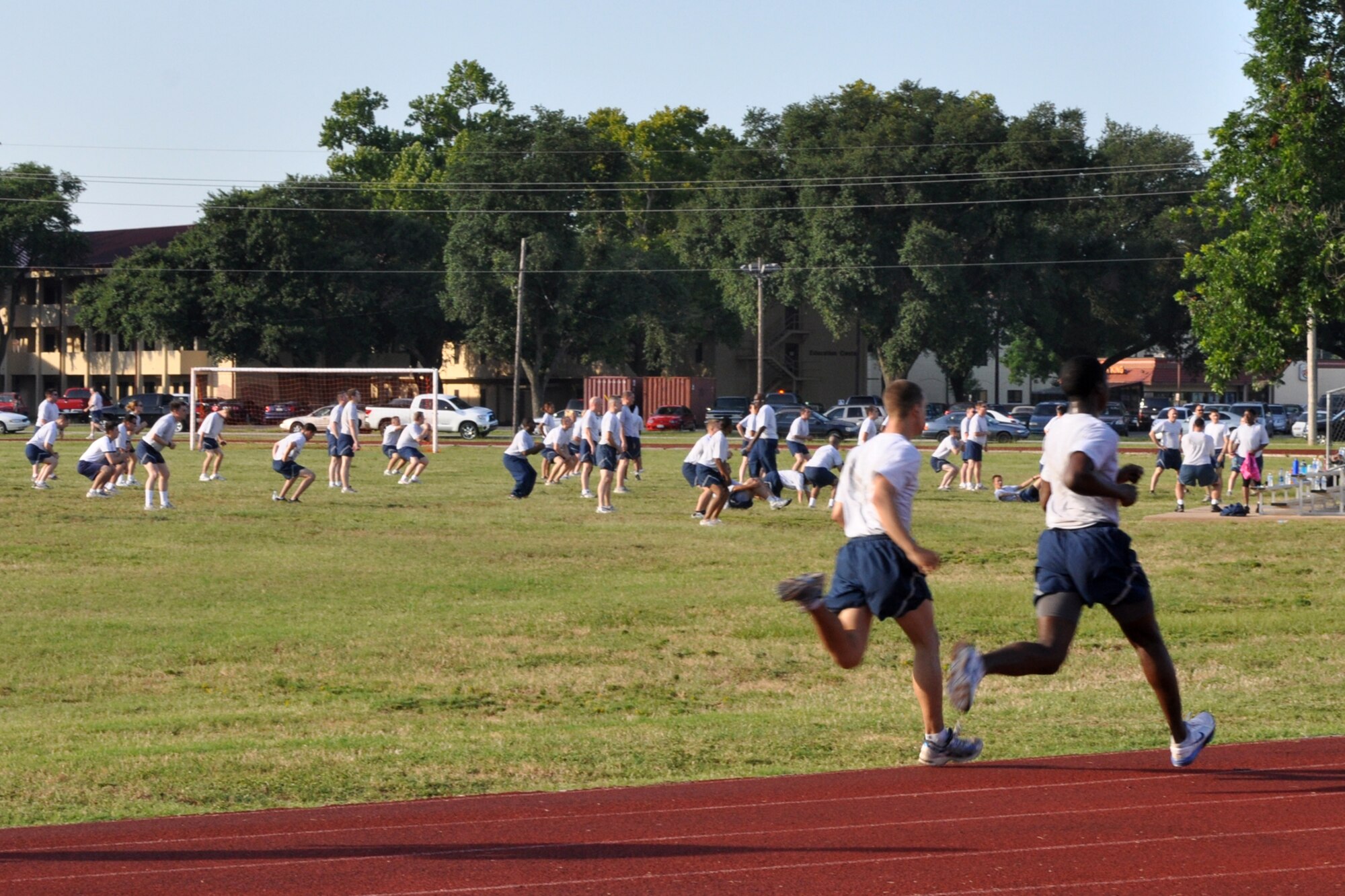 Air Force servicemembers keeping fit to fight at the Fitness Center on Barksdale Air Force Base, La., June 28, 2010. New minimum requirements for the Air Force fitness tests make training even more important than before. (U.S. Air Force photo/Tech. Sgt. Jeff Walston)