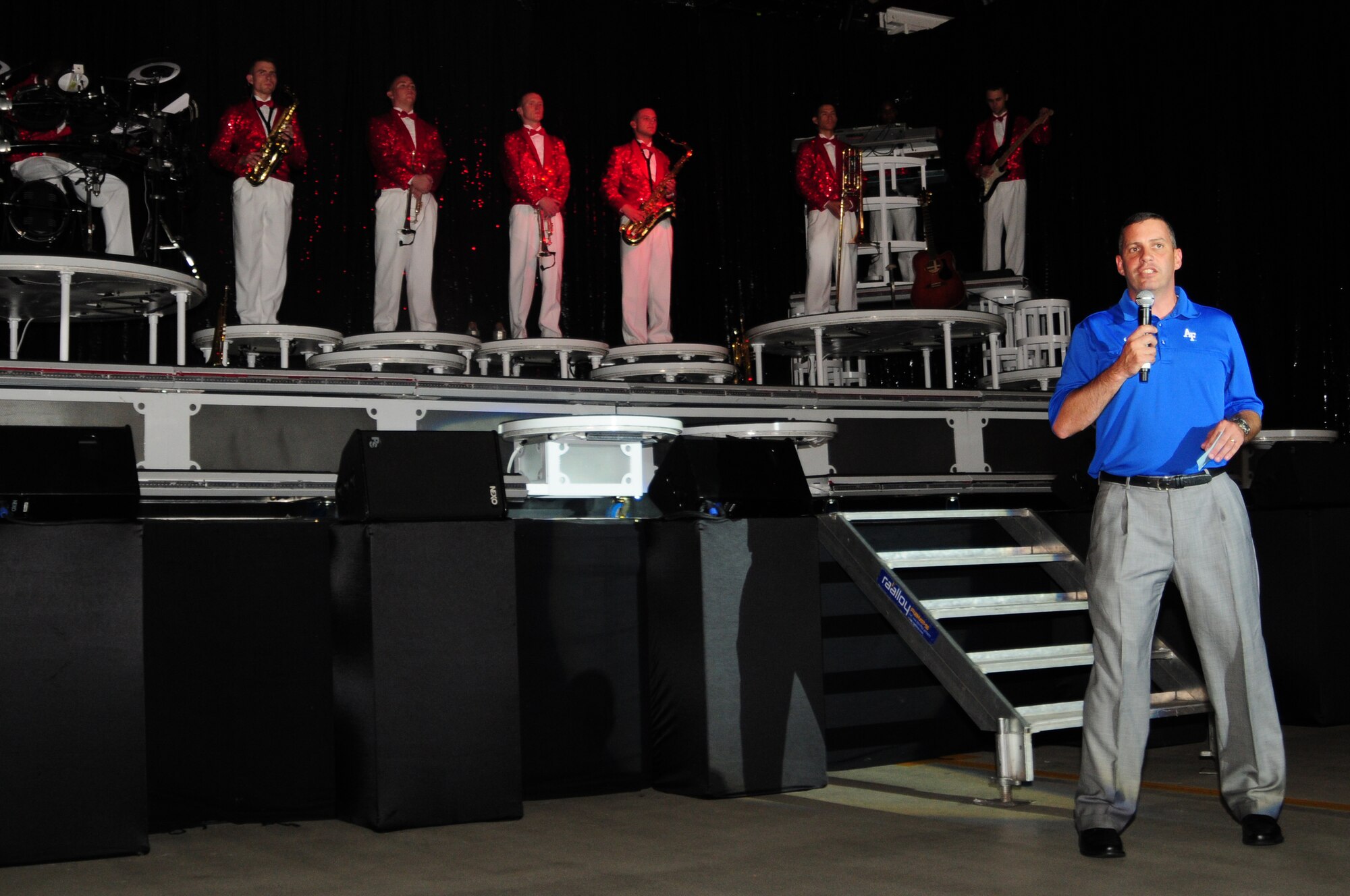 Col. Bill Lewis, 48th Fighter Wing vice commander, welcomes the audience to the Tops In Blue concert held at RAF Lakenheath, England, June 30. Lakenheath was the sixth stop of Tops In Blue’s 2010 “We Believe” world tour. (U.S. Air Force photo/Airman 1st Class Lausanne Morgan)