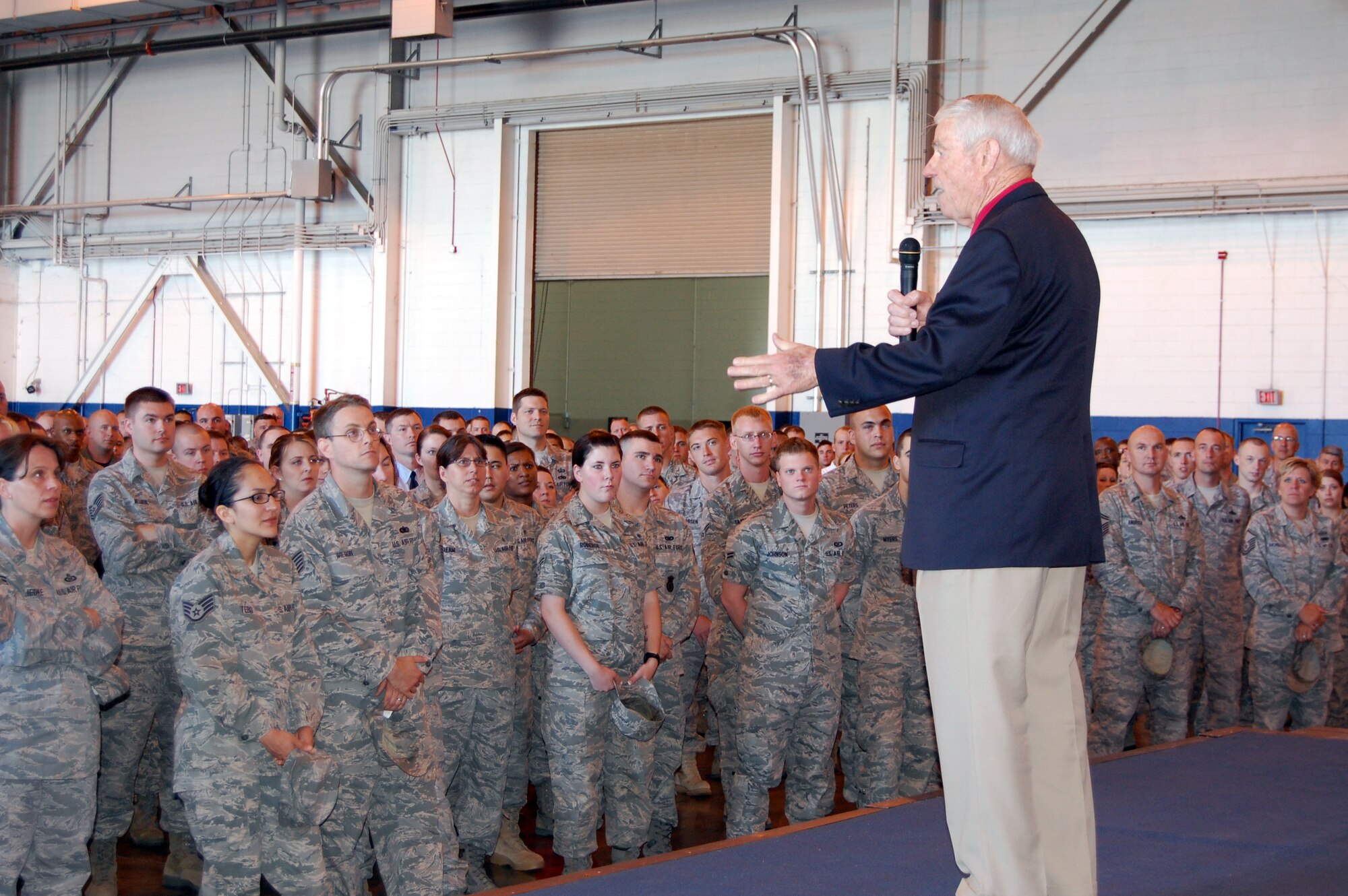 OFFUTT AIR FORCE BASE, Neb. - Retired Chief Master Sgt. Robert Gaylor, fifth chief master sergeant of the Air Force, addresses more than 1,000 enlisted members at the Bennie Davis Maintenance Facility here during his visit to Offutt July 29. Chief Gaylor encouraged Offutt?s Airmen to take advantage of every opportunity by maintaining a constant positive attitude and honing their technical aptitudes. U.S. Air Force photo by Airman 1st Class Peter R.O. Danielson
