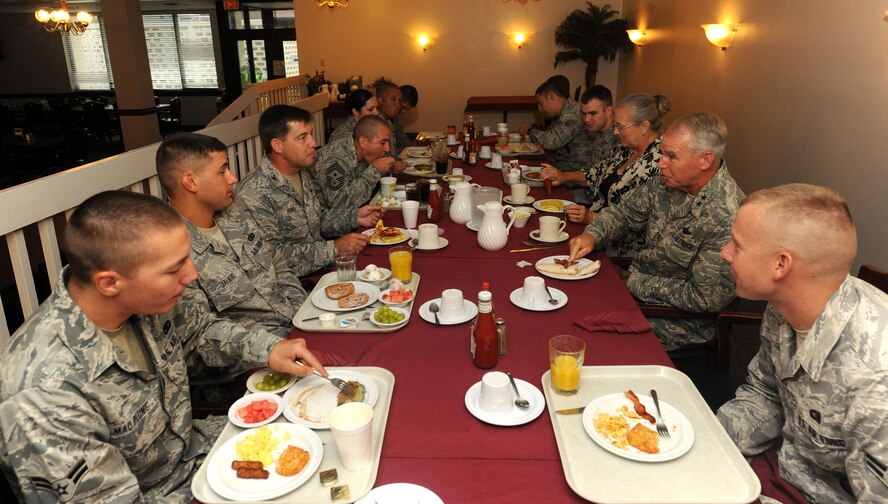 MOODY AIR FORCE BASE, Ga. -- Maj. Gen. William Holland, 9th Air Force commander,  sits down to have breakfast with members of the 93rd Air Ground Operations Wing during his visit here June 30. General Holland spoke to the Airmen from the 93rd AGOW about their most recent deployment to Haiti. (U.S. Air Force photo by Airman 1st Class Benjamin Wiseman/RELEASED)