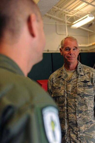 MOODY AIR FORCE BASE, Ga. -- Master Sgt. Erin Thorson, 41st Rescue Squadron aerial gunner instructor, speaks with Maj. Gen. William Holland, 9th Air Force commander, during his visit to the base here June 29. Sergeant Thorson was explaining the several different types of aerial insertion and extraction equipment. (U.S. Air Force photo by Airman 1st Class Benjamin Wiseman/RELEASED)