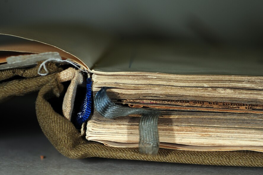 BARKSDALE AIR FORCE BASE, La. -- The Eighth Air Force Museum received a significant donation of World War II history June 9 when Joy Bolesta, wife of the late Stanley Bolesta, donated the journal her husband kept while held captive in a German prisoner of war camp. The journal, which has stayed in the Bolesta family since his liberation in 1945, contains a detailed, hand-written account of life as a POW in a camp known as Stalag Luft 1 during World War II. (U.S. Air Force photo by Senior Airman Joanna M. Kresge)