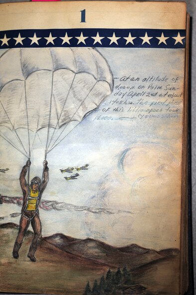 BARKSDALE AIR FORCE BASE, La. – A hand-drawn picture is displayed on the first page of Claude McCrocklin’s Prisoner of War journal after he donated it to the Eighth Air Force Museum, June 25. Mr. McCrocklin was held at a German POW camp during World War II. The caption in the picture reads “At an altitude of 4,000 feet on Palm Sunday, April 2nd at about 1405 hours the first phase of this little epic took place.” (U.S. Air Force photo by Senior Airman Joanna M. Kresge)