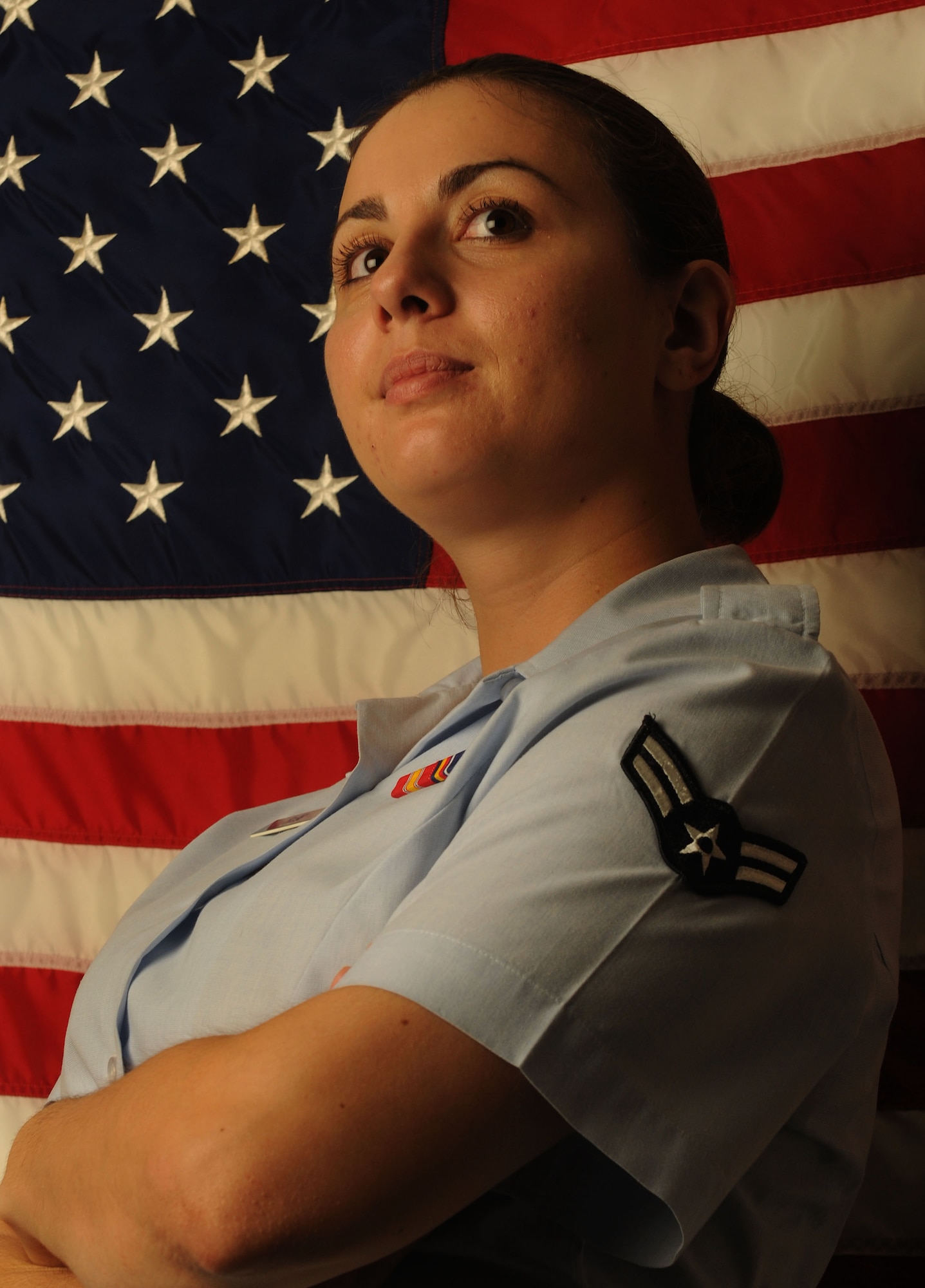 MOODY AIR FORCE BASE, Ga. -- Airman 1st Class Alexandra Fleig, 23rd Force Support Squadron customer support representative, recently became a United States citizen April 16. Airman Fleig is a native from Romania and wanted to become a U.S. citizen to enjoy the freedoms of being an American. (U.S. Air Force photo by Airman 1st Class Benjamin Wiseman/RELEASED)