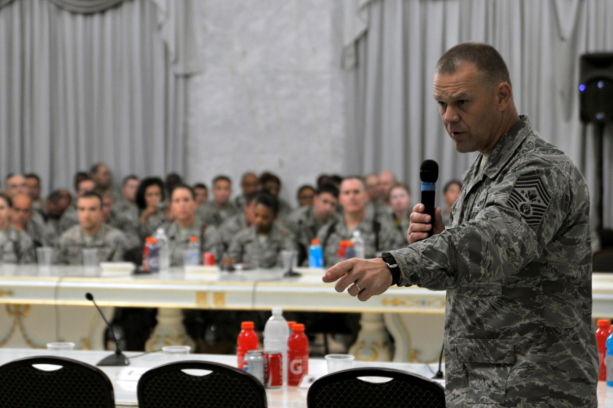 Chief Master Sergeant of the Air Force James A. Roy speaks to Airmen June 29, 2010 at the Al Faw Palace, Camp Victory, Iraq. CMSAF Roy spoke to the Airmen about deployments, suicide preventions, and answered Airmen's questions. CMSAF Roy visited several bases in the U.S. Central Command's area of responsibility where Airmen are deployed in support of Operations Enduring Freedom and Iraqi Freedom. (U.S. Air Force photo by Senior Airman Perry Aston) (Released)