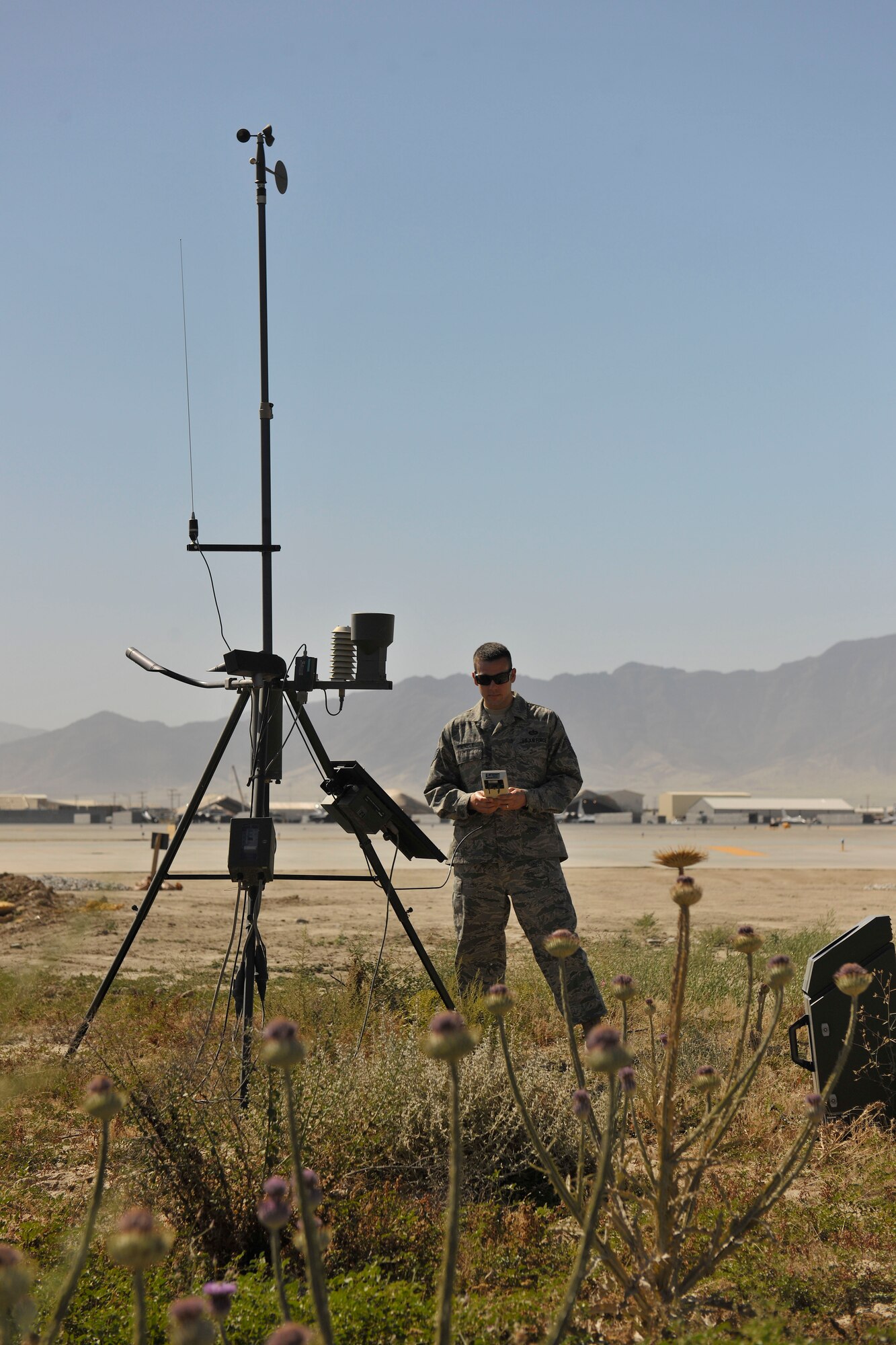 Tech. Sgt. Richard Kienzle reviews a read out from a tactical mobile observation system, TMQ-53, at Bagram Airfield, Afghanistan, June 28, 2010. The TMQ-53 forecasts wind temps, dew points, and pressure. Sergeant Kienzle is assigned to the 455th Expeditionary Operations Support Squadron Combat Weather Team and is a resident of Ewa Beach, Hawaii. (U.S. Air Force photo/Staff Sgt. Christopher Boitz)