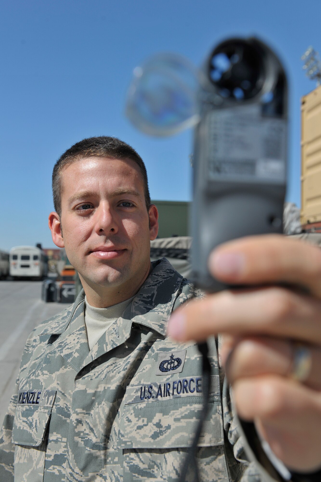 Tech. Sgt. Richard Kienzle uses a kestrel during a weather survey at Bagram Airfield, Afghanistan, June 28, 2010. A kestrel takes readings on wind speed, air pressure, altitude, and air temperature. Sergeant Kienzle is assigned to the 455th Expeditionary Operations Support Squadron Combat Weather Team and is a resident of Ewa Beach, Hawaii. (U.S. Air Force photo/Staff Sgt. Christopher Boitz)