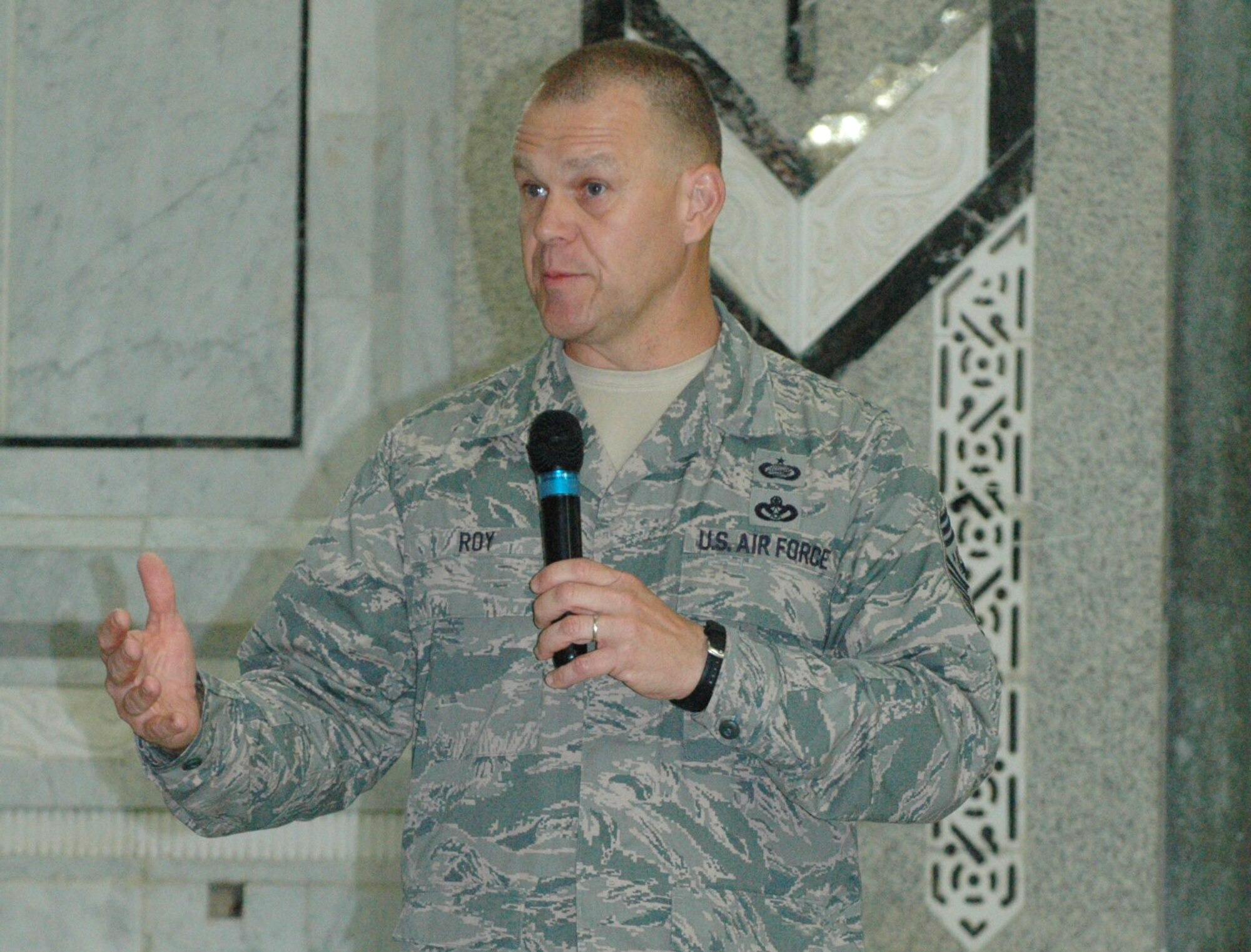 Chief Master Sergeant of the Air Force James Roy speaks to Airmen gathered at Al Faw palace on the Victory Base Complex, Baghdad.  During the meeting, the Chief had the opportunity to share his top priorities and receive feedback from Airmen.  This visit also marked the Chief's one-year anniversary as the top enlisted Air Force leader.  (U.S. Air Force photo by Master Sgt. Louis Conzo)