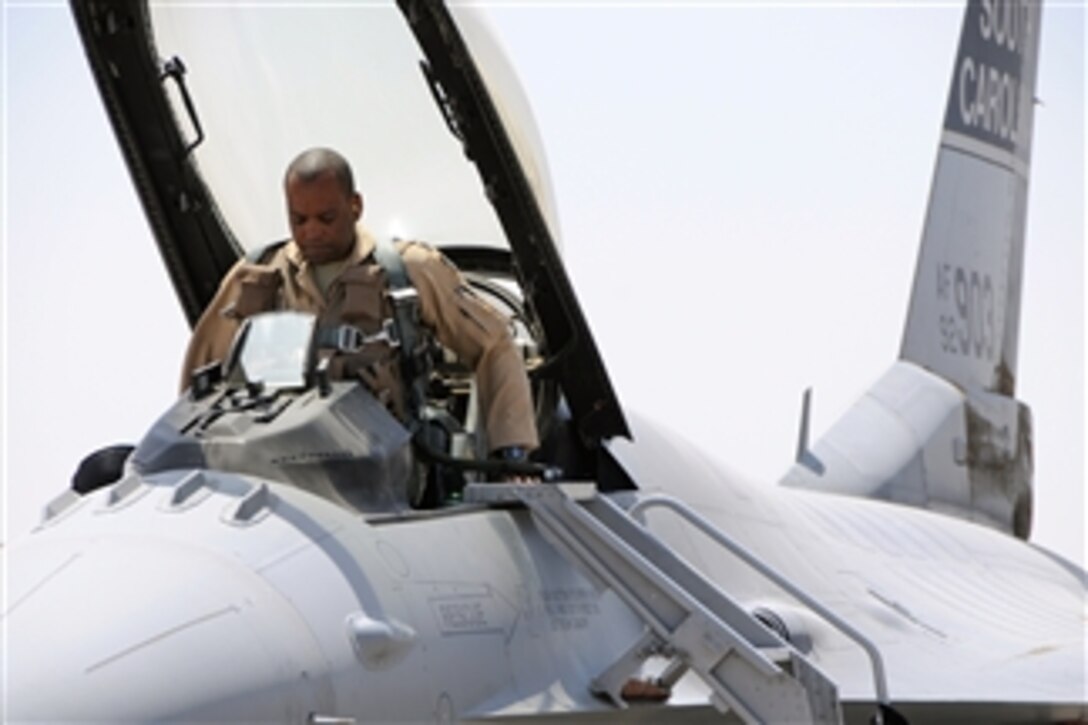 U.S. Air Force Lt. Col. Terrence Hedley, a fighter pilot with the 157th Fighter Squadron out of McEntire Joint National Guard Base, S.C., prepares to take off from Joint Base Balad, Iraq, to participate in a mission on June 21, 2010.  