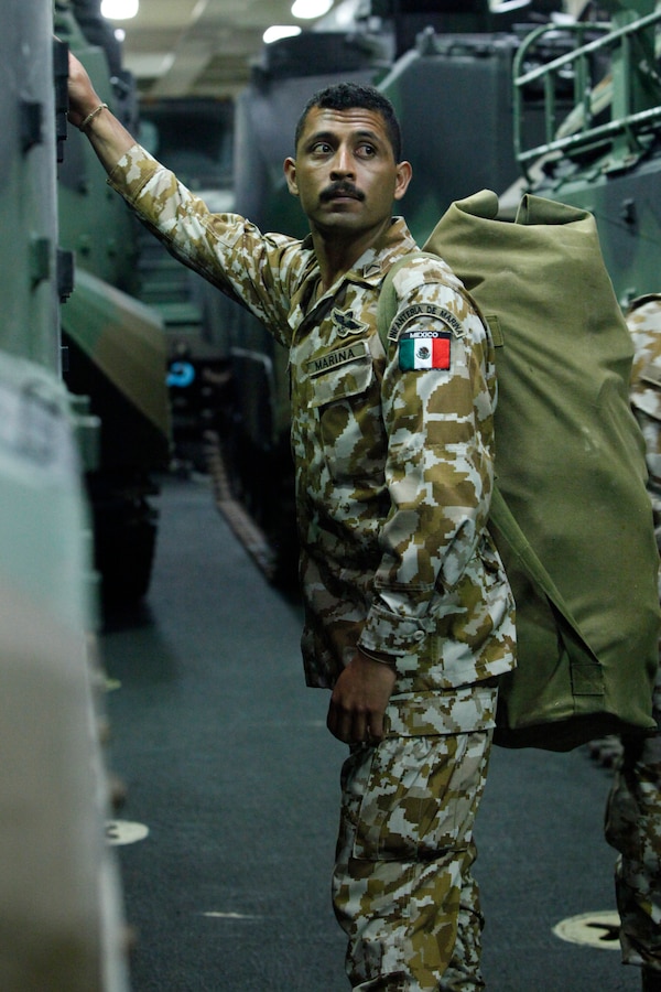 A Mexican marine waits to leave with U.S. Marine Corps 4th Platoon, Company C, 3rd Assault Amphibian Battalion, 1st Marine Division on amphibious transport dock ship USS New Orleans (LPD 18) July 2, 2010, in the Pacific Ocean off the coast of Peru. Together, the U.S. Marines and partner nation Marines are serving aboard New Orleans in support of support of Partnership of the Americas 2010 (POA-10) and Southern Exchange 2010 (SE-10), two separate U.S. Marine Corps Forces, South (MARFORSOUTH) exercises being executed concurrently with partner nation forces from Argentina, Brazil, Canada, Colombia, Ecuador, Mexico, Paraguay, Peru and Uruguay.
