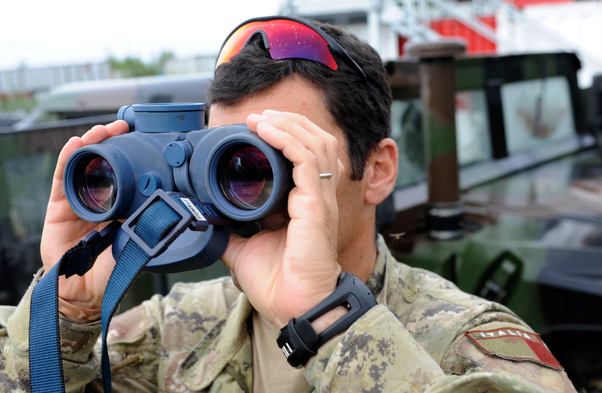 An Italian Air Force Joint Terminal Air Controller looks at his target during Distant Frontier July 2, 2010, Eielson Air Force Base, Alaska. Having solid visual contact and recognition is a crucial for the JTAC to accomplish his mission with effectiveness. (U.S. Air Force photo/Airman 1st Class Willard E. Grande II)