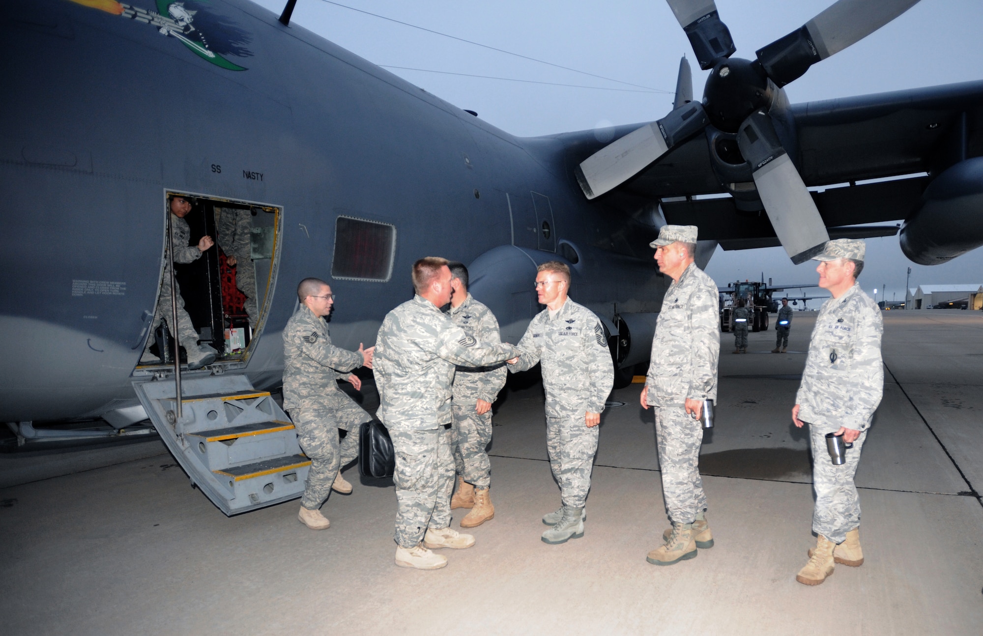 27th Special Operations Wing leadership greets Airmen July 2, 2010, as they return from deployments in Afghanistan. Operation Homecoming welcomed back Airmen from several Cannon squadrons. (U.S. Air Force photo by Airman 1st Class Maynelinne De La Cruz/Released)