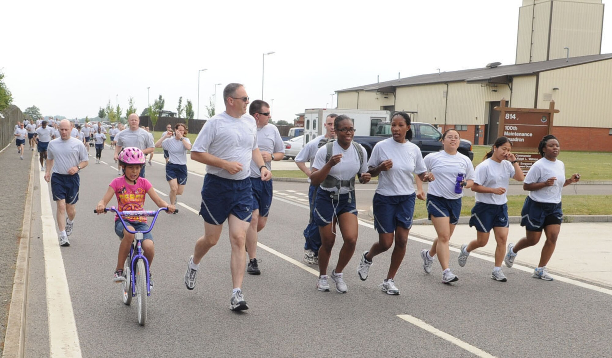 RAF MILDENHALL, England -- Children and spouses joined Airmen in the 100th Air Refueling Wing 5K fun run June 25 on the south side of base. The run is a monthly event held to promote health and fitness. (U.S. Air Force photo/Karen Abeyasekere)