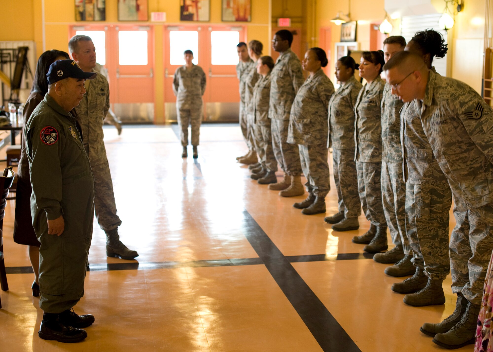 MISAWA AIR BASE, Japan -- Kazumasa Taneichi, Misawa City mayor and honorary commander of the 35th Fighter Wing for the day, talks with the Misawa Air Base Enlisted Council at the Grid, formerly known as the Airman's Center, July 2. The Airmen asked Mayor Taneichi questions about how they could further improve relations with the local community. (U.S. Air Force photo/Staff Sgt. Samuel Morse)
