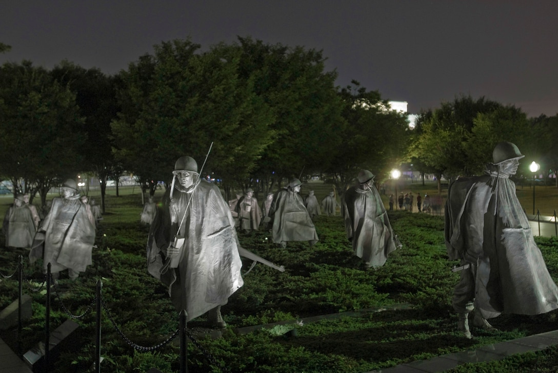 Tourists visit the Korean War Veterans Memorial in Washington, D.C., June 30, 2010.  Two years of negotiations led to an armistice agreement signed July 27, 1953. The United States lost more than 36,000 servicemembers during the Korean War, with more than 92,000 wounded, more than 8,000 missing in action and more than 7,000 taken as prisoners of war.