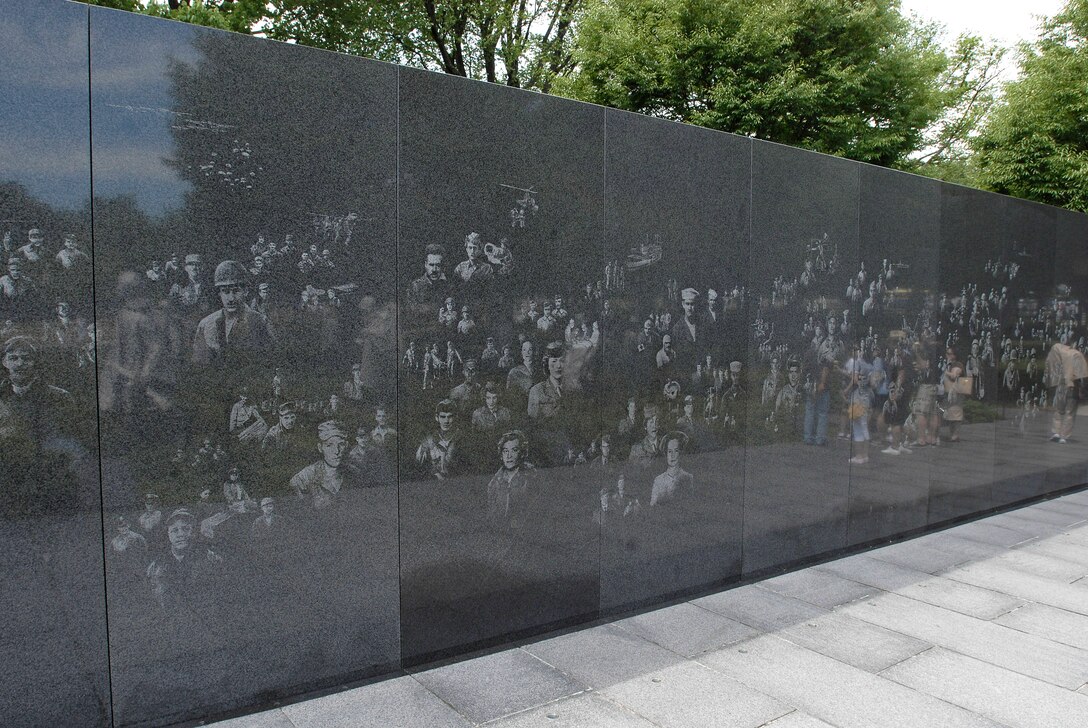 Tourists visit the Korean War Veterans Memorial in Washington, D.C., June 30, 2010. Seoul, the South Korean capital, fell June 28. President Harry S. Truman, concerned after World War II about the spread of communism, recognized the importance of repelling military aggression on the Korean peninsula.