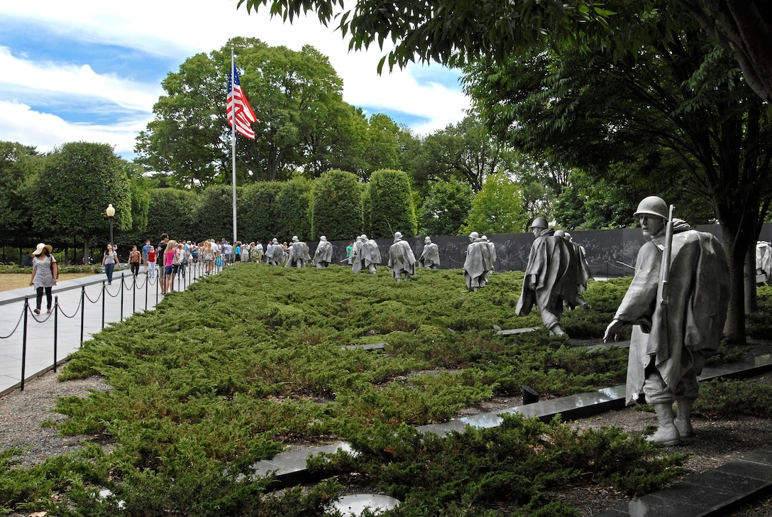 Tourists visit the Korean War Veterans Memorial in Washington, D.C., June 30, 2010. The Battle of Pusan Perimeter raged from August to September 1950, with the U.S. Air Force and Navy air forces attacking North Korean logistics operations and transportation hubs.