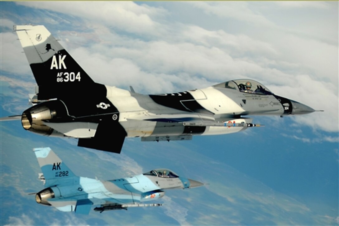 U.S. Air Force F-16 Aggressor aircraft from the 18th Aggressor Squadron fly a sortie over Alaska, June 24, 2010, during exercise Red Flag Alaska 10-3.  Red Flag Alaska is a Pacific Air Forces-directed advanced aerial exercise that trains U.S. and allied air force pilots for real combat situations.