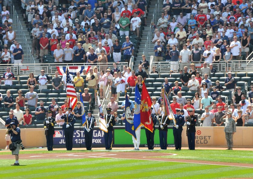 Honor Guard members from the different Armed Services post the colors during the National Anthem at Target Field during the Minnesota Twins vs. Tampa Bay Rays baseball game, July 3. (U.S. Air Force photo/SrA Noah R. Johnson)