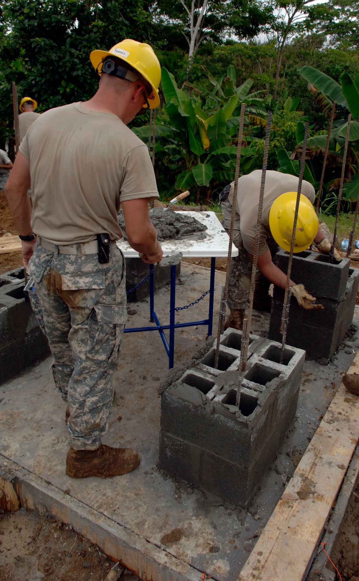 Construction Engineers from the 372nd Engineer Company, an Army Reserve unit deployed in support of New Horizons Panama 2010, builds support columns for a new water tower at Santa Librada Elementary School July 2. (U.S. Air Force photo/Tech. Sgt. Eric Petosky)
