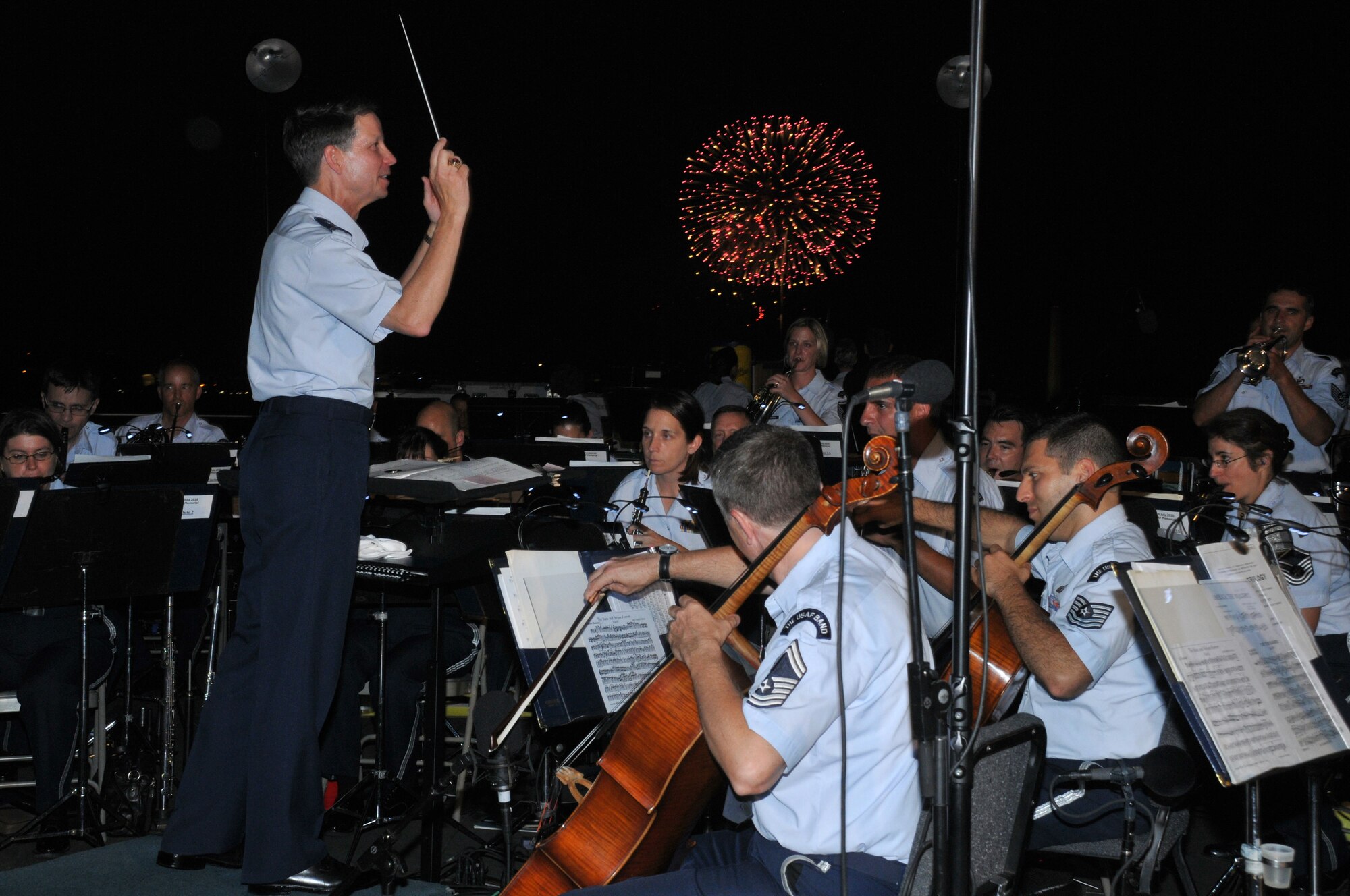 Air Force District of Washington Commander Maj. Gen. Darrell Jones conducts The U.S. Air Force Band in John Phillip Sousa's "Stars and Stripes Forever." The concert was part of the Fourth of July 2010 celebration on the Air Force Memorial in Arlington, Va. More than 5,000 spectators turned out at the Air Force memorial. 