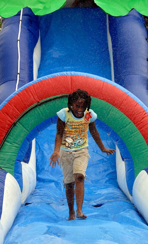 Water slides, kid rides and a variety of games were among the entertainment options available to the attendees of Freedom Fest 2010 at the Sheppard Clinic pavilion at Sheppard Air Force Base, Texas, July 3, 2010. About 35,000 people attended the event. (U.S. Air Force Photo/Mike Litteken)