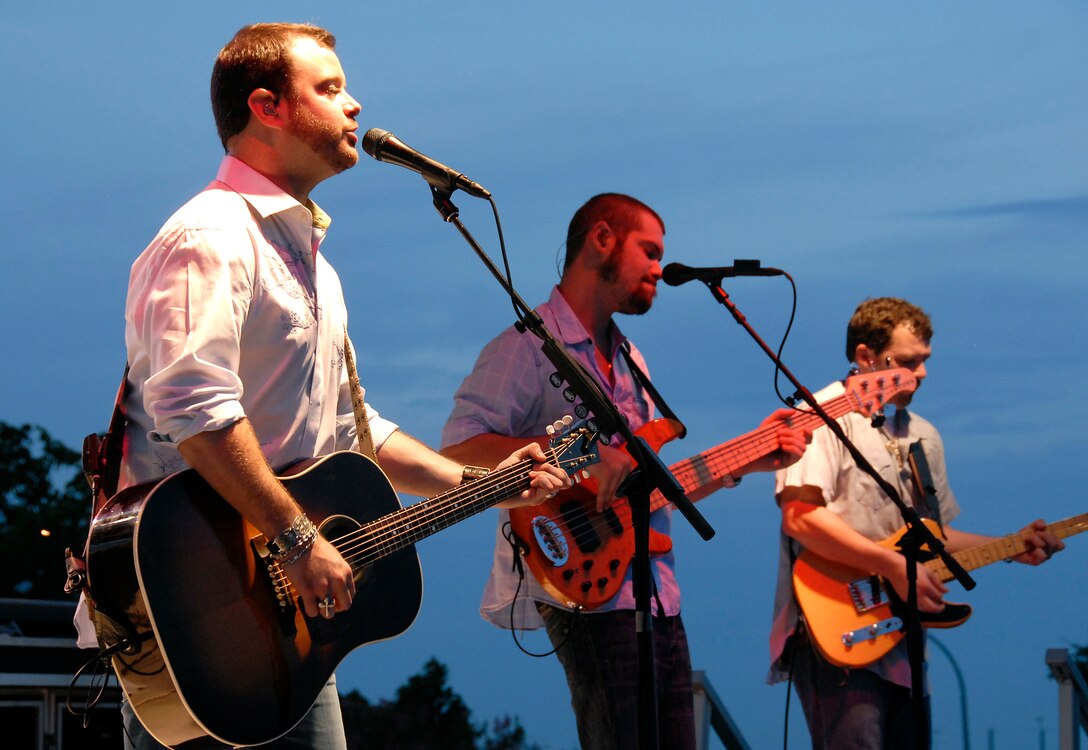 Wade Bowen, Texas-born country singer, performs various songs to a crowd of about 35,000 people during Freedom Fest 2010 July 3, 2010, at the Sheppard Clinic pavilion at Sheppard Air Force Base, Texas.  Freedom Fest 2010 featured a volleyball tournament, car show, a variety of foods, performances by various musical bands and a fireworks presentation. (U.S. Air Force Photo/Mike Litteken)