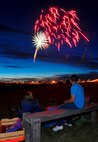 MINOT AIR FORCE BASE, N.D. – Tech. Sgt. Richard Aumann, 5th Maintenance Group, and his family enjoy the shock and awe of the Minot AFB fireworks display here July 4. Minot’s Airmen and their families enjoyed fun, festivities and fireworks both on- and off-base during the 2010 celebration of our nation’s independence. (U.S. Air Force photo by Master Sgt. Michael Gaddis)