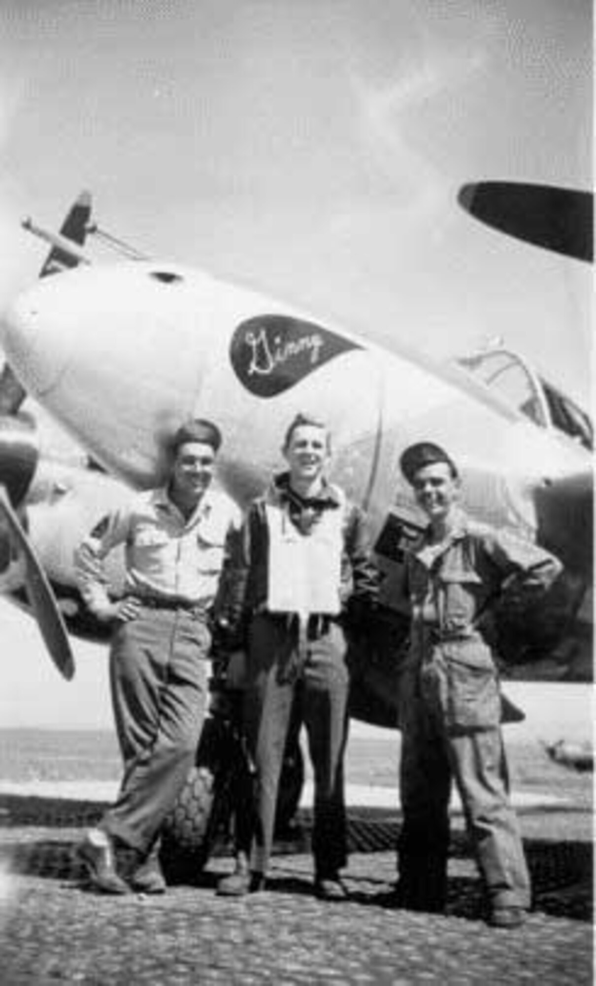 1st Lt. Jim Graham, seen here flanked by two crew chiefs, stands in front of his P-38 "Ginny," one of the 71st Fighter Squadron's fleet during World War II. (Photo courtesy/Jim Graham)