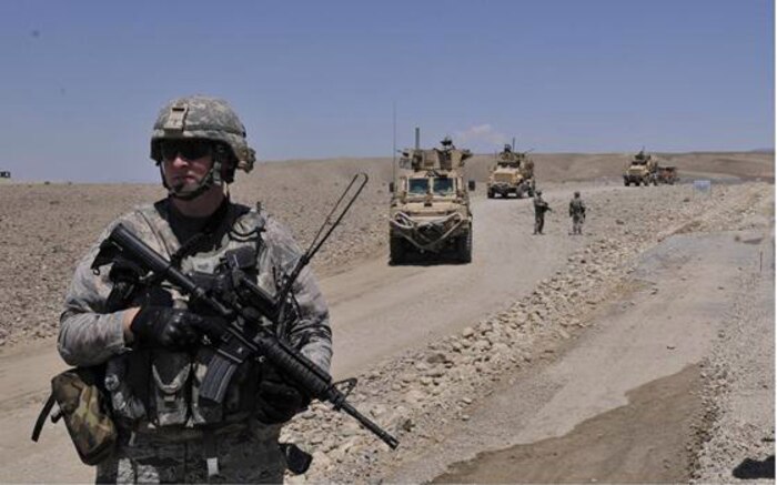 Staff Sgt. Johns Kingsley provides security for Afghan Provisional Reconstruction Team engineers while coordinating communications with adjacent units on objectives. The PRT currently has 54 projects worth a total of $75 million and has completed more projects than any other PRT supporting Operation Enduring Freedom. Sergeant Kingsley is an NCOIC with the 628th Communications Squadron based out of Joint Base Charleston, S.C.