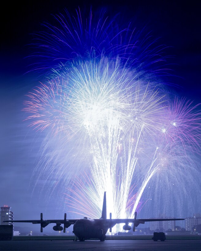 Fireworks burst over Yokota Air Base, Japan, July 3, 2010. The day kicked off with the Firecracker 5K run and continued with a wide variety of activities throughout the day including go-carts, a petting zoo, live entertainment, food and fireworks. (U.S. Air Force photo/Osakabe Yasuo)
