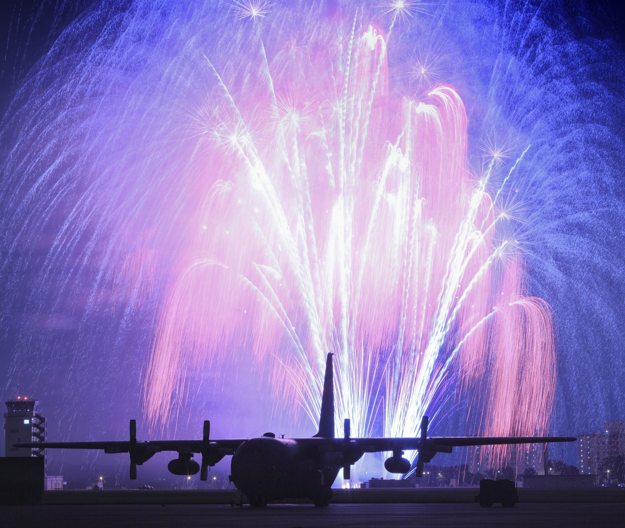 Fireworks burst over Yokota Air Base, Japan, July 3, 2010. Airmen from the 374th Force Support Squadron provided Yokota residents and their guests with events for all ages. (U.S. Air Force photo/Osakabe Yasuo)

