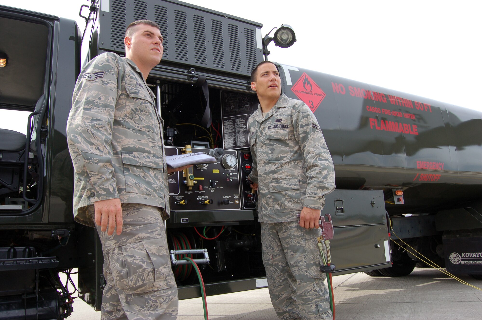WRIGHT-PATTERSON AIR FORCE BASE, Ohio – Senior Airman Jonathon Kunkel, 445th Logistics Readiness Squadron, trains alongside Airman First Class Adrian Leyba, 86th Logistics Readiness Squadron, at Ramstein Air Base, Germany, June 9. More than 40 members of the 445 LRS spent their annual tour in Germany June 5-19. (U.S. Air Force photo/Maj. Jose Cardenas)