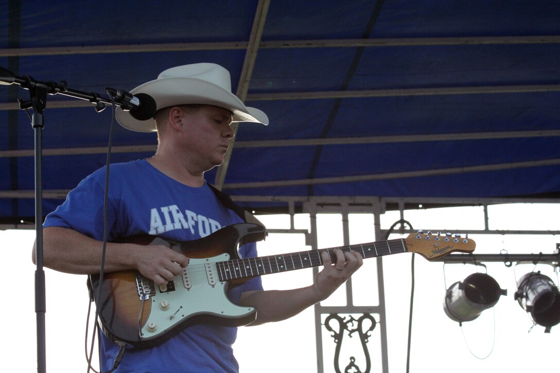 Technical Sergeant Steve Wilson performs with Top Flight performs at Woodlawn Lake Park in San Antonio on the 4th of July, 2010.