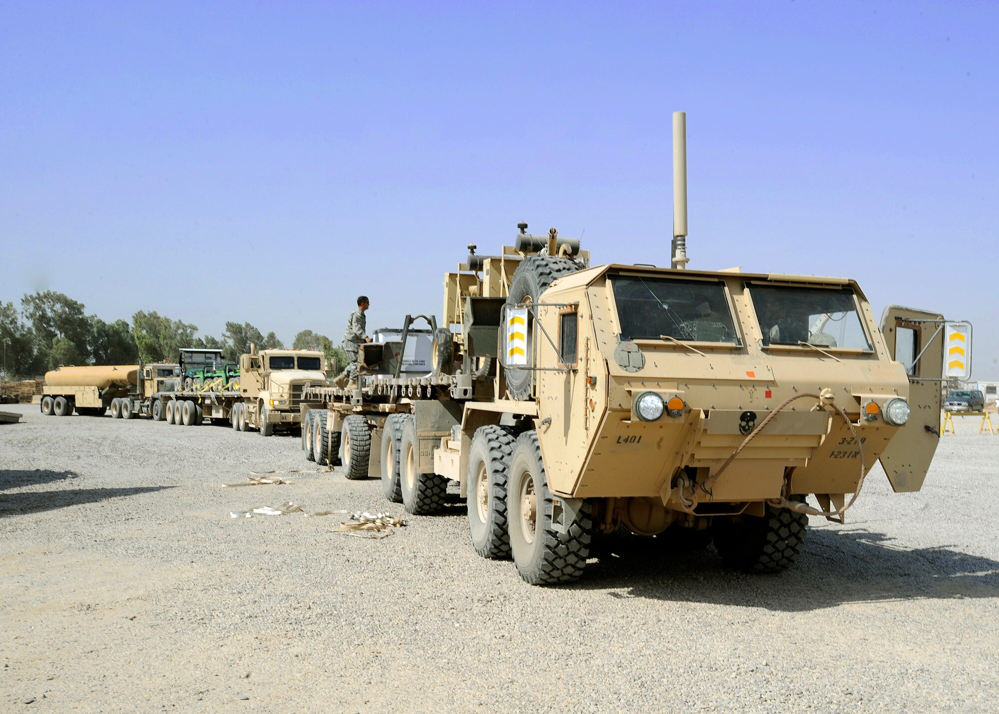 A convoy of equipment arrives to be processed and inspected June 16, 2010, at the Redistribution Property Assistance Team Yard, Joint Base Balad, Iraq. . The RPAT yard is a joint venture operation for the Army and the Air Force. The Airmen and Soldiers here are scheduled to redeploy $17 billion in equipment over a six-month deployment. (U.S. Air Force photo/Senior Airman Matt Coleman-Foster)