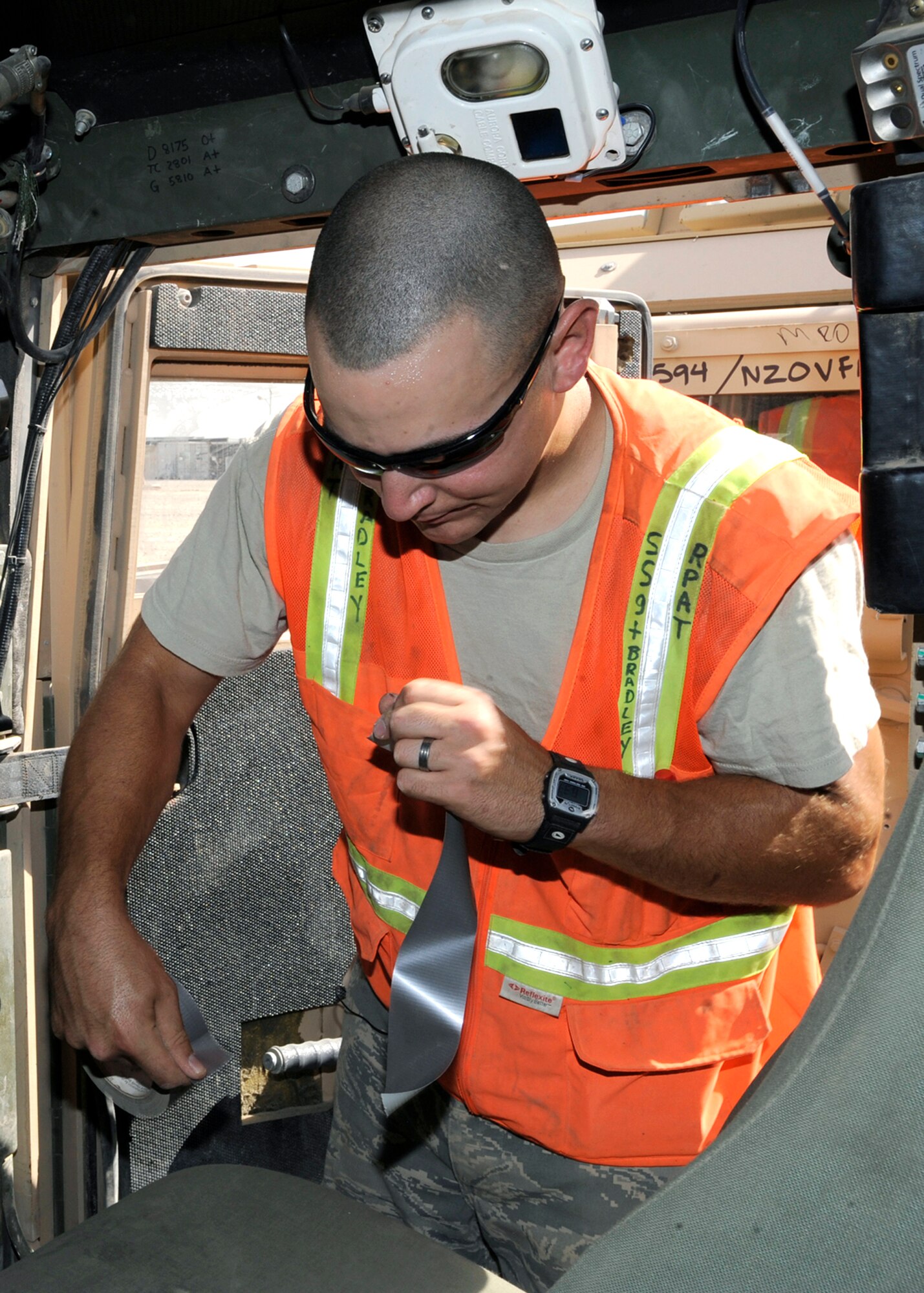 Staff Sgt. Bryan Bradley processes a humvee for departure June 16, 2010, at the Redistribution Property Assistance Team Yard, Joint Base Balad, Iraq. The RPAT was developed to process billions of dollars in equipment at one of eight RPATS spread across Iraq, for refurbishment in the United States or for deployment to locations of higher priority. Sergeant Bradley is assigned to the 732nd Expeditionary Logistics Readiness Squadron. (U.S. Air Force photo/Senior Airman Matt Coleman-Foster)