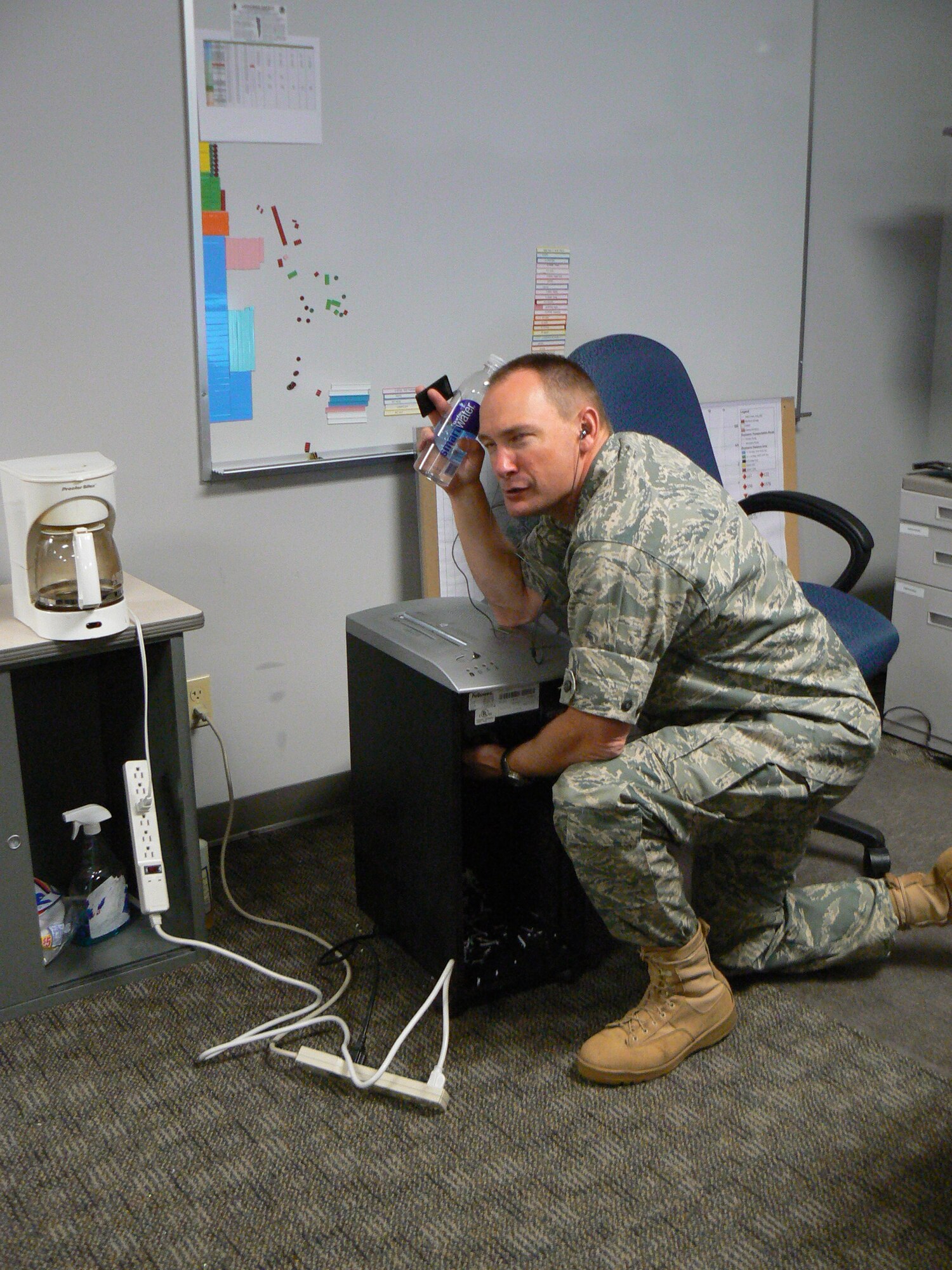 Colonel Catastrophe is cleaning up after a long week at the office, but there is much to do before he can leave for the weekend. There are at least five unsafe conditions pictured and the first three people with correct responses to the 21st Space Wing Safety Office, 556-4392, win a prize. If you identify unsafe conditions in the workplace, home or while exercising, be a good wingman and correct them. (U.S. Air Force photo/Luis Harris)
