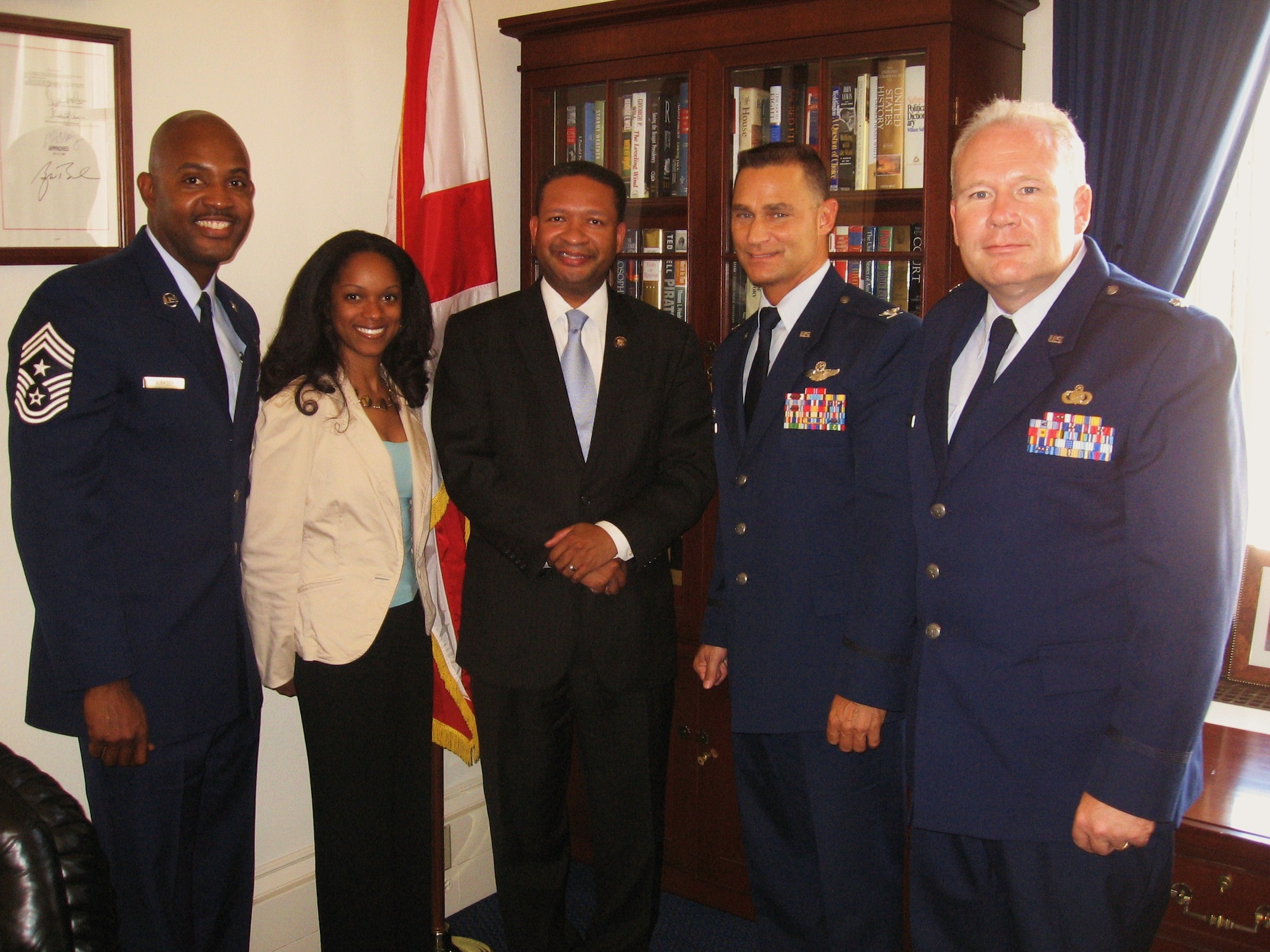 Leaders of the 908th Airlift Wing recently traveled to Washington, D.C. to discuss important issues with members of Alabama's Congressional delegation, an annual requirement for wing commanders. Command Mast Chief Cameron Kirksey, Wing commander Col. Brett Clark and Public Affairs Chief Lt. Col. Jerry Lobb pose for a photograph with Representative Artur Davis of the Alabama 7th Congressional District and a member of his staff.