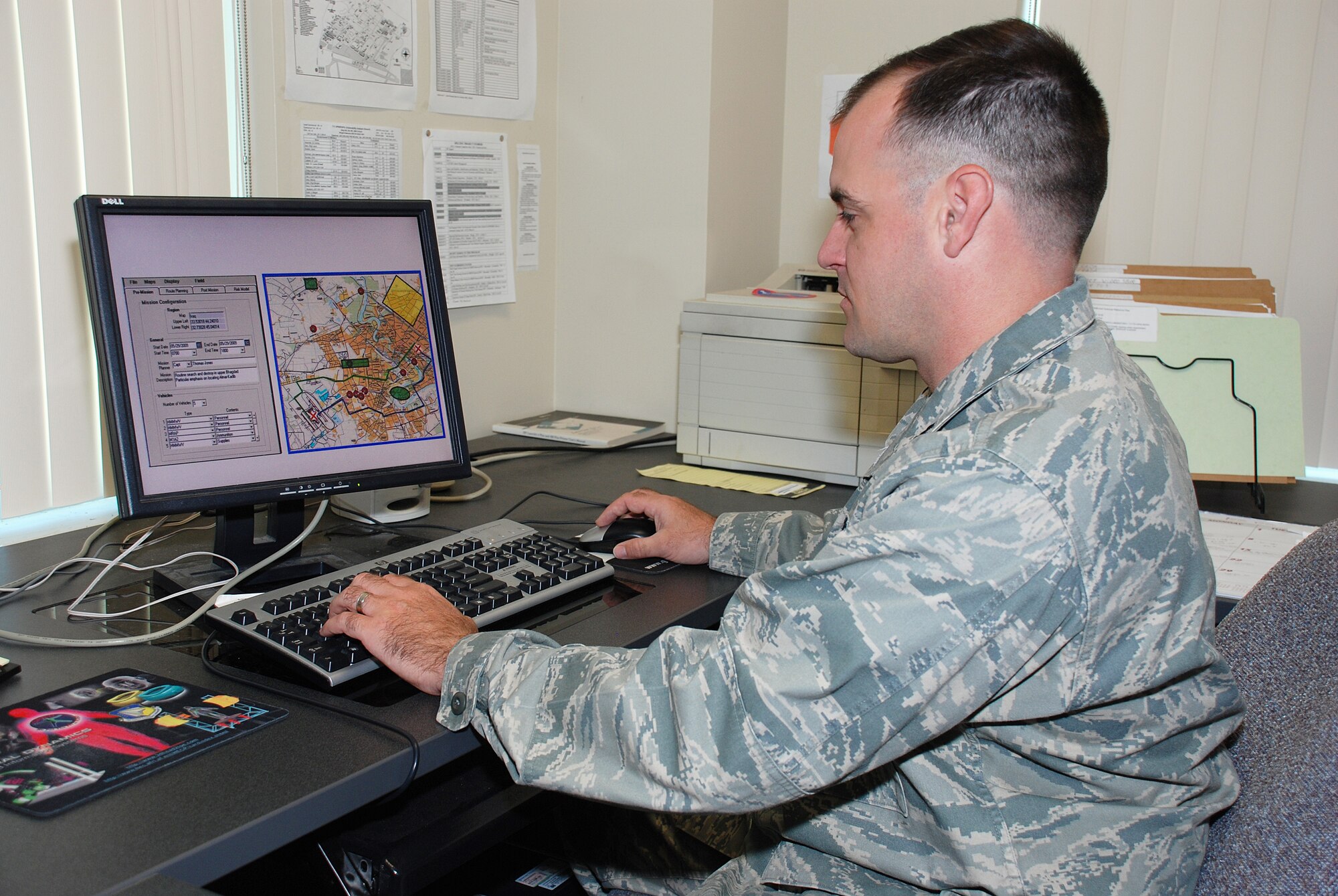 Captain Kevin Kupferer of the Human Effectiveness Directorate, Biosciences and Performance Division views a Risk Assessment for Frontline Troops software simulated “best routes” display. The software, developed by Infoscitex Corporation, will help mission planners and commanders to plan missions with the lowest possible risk based on information collected from a number of sources. (Photo by Chris Gulliford, 711 HPW)