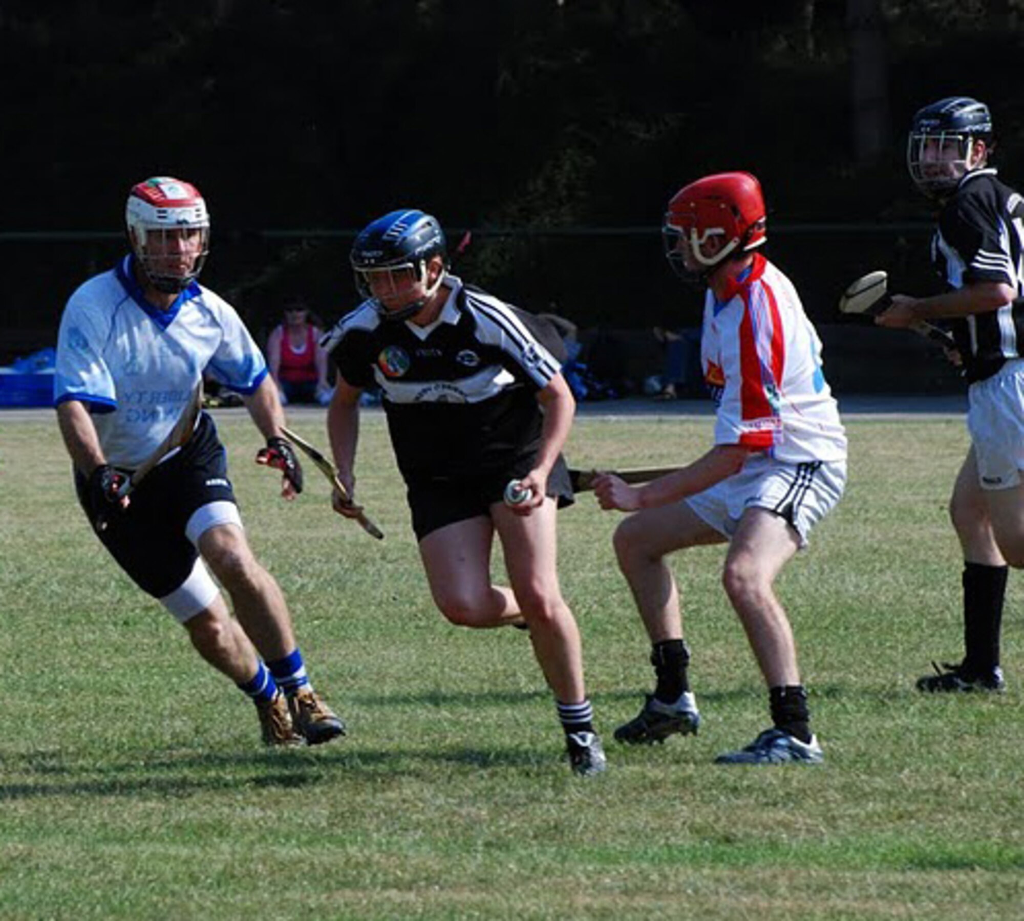 Maj. Tim Neylon of the 48th Medical Group (left), defends against an attacking player during the European County Board Hurling tournament in Brussels, Belgium, on June 26. The Lakenheath Hurling Team, the Wild Geese, finished third place. (U.S. Air Force photo courtesy of Maj. Tim Neylon)