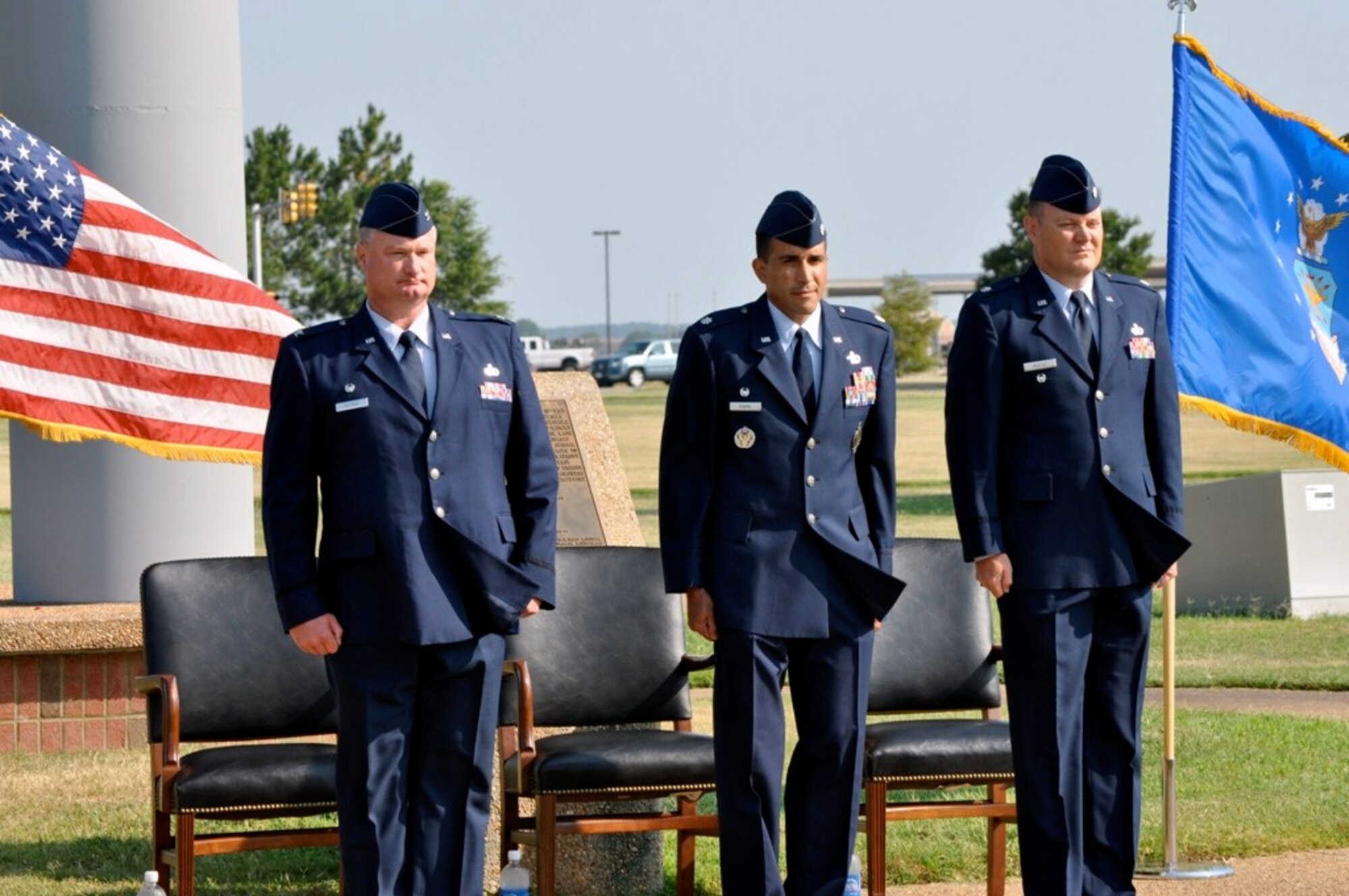 LANGLEY AIR FORCE BASE, Va. -- Col. Kevin Altman (left), then-633d Mission Support Group commander, stands at attention alongside Lt. Col. Randy Rivera (center) and Lt. Col. Christopher Wegner at the 633d Contracting Squadron change of command ceremony at Air Power Park June 28. Colonel Wegner assumed command of the squadron from Colonel Rivera. (Courtesy photo)