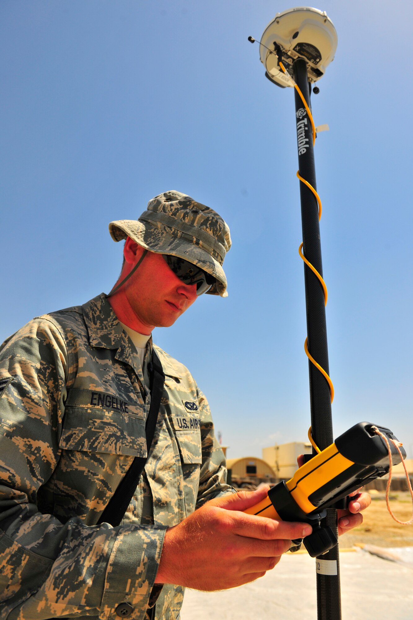 Staff Sgt. Cody Engelke, an engineering journeyman assigned to the 577th Expeditionary Prime BEEF Squadron, conducts a site survey of a new facility at Bagram Airfield, Afghanistan, July 6, 2010. The site is scheduled to be the future location for transient quarters. (U.S. Air Force photo/Staff Sgt. Christopher Boitz)